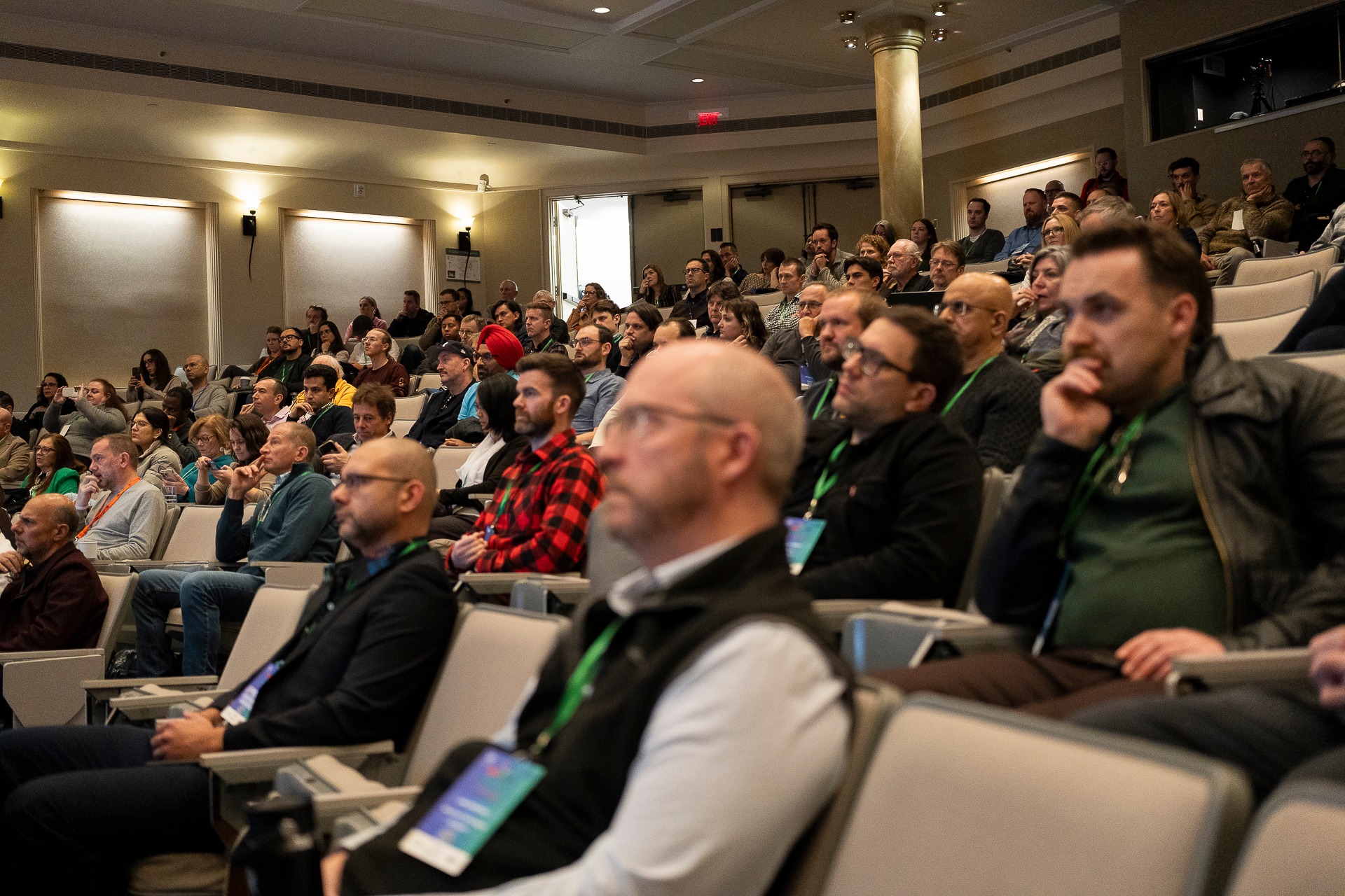 Engaged audience taking notes